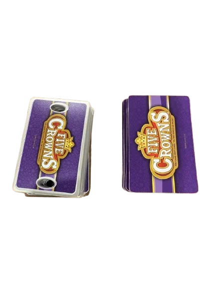 Close-up of Five Crowns cards showing the five different suits including stars.